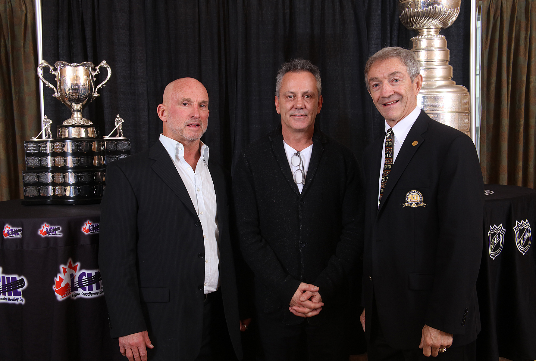 Ken Linseman, Doug Gilmour and Rick Smith celebrate the Hall's 75th anniversary